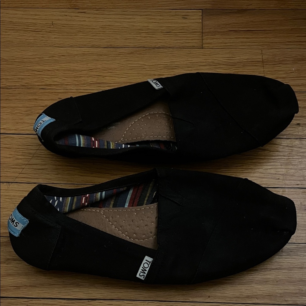 TOMS Black Canvas Slip-Ons